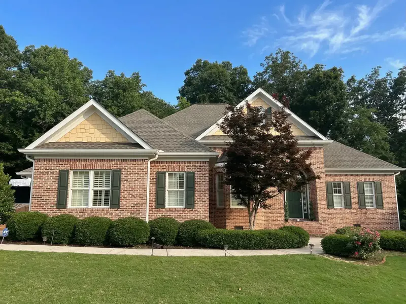 Completed roof replacement on brick ranch home in BridgeMill, Canton GA